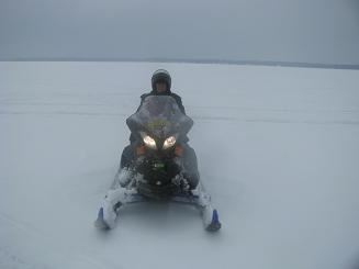 Deputy Riding Snowmobile